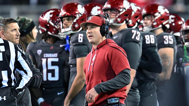 Nov 9, 2024; Pullman, Washington, USA; Washington State Cougars head coach Jake Dickert watches the video board during a game against the Utah State Aggies in the first half at Gesa Field at Martin Stadium. Mandatory Credit: James Snook-Imagn Images