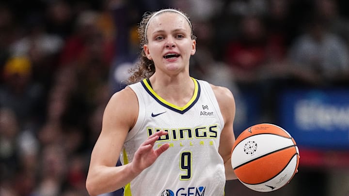 Dallas Wings guard Grace Berger (9) rushes up the court Tuesday, Aug. 12, 2025, during the game at Gainbridge Fieldhouse in Indianapolis. The Dallas Wings defeated the Indiana Fever, 81-80.