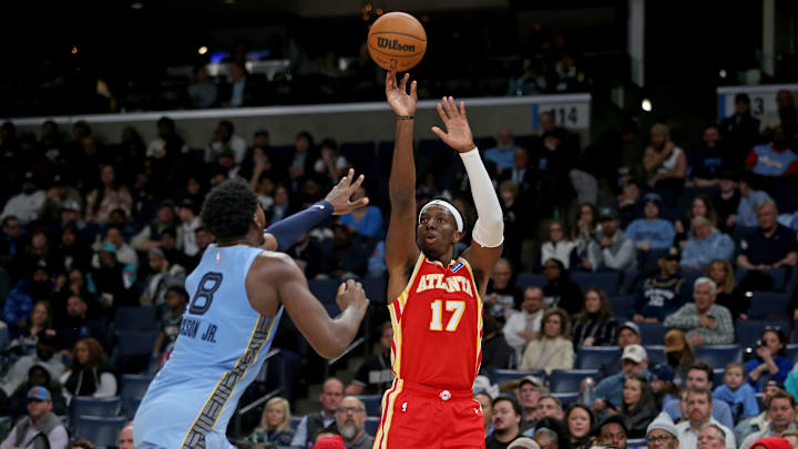 Jan 21, 2026; Memphis, Tennessee, USA; Atlanta Hawks forward Onyeka Okongwu (17) shoots for three as Memphis Grizzlies forward/center Jaren Jackson Jr. (8) defends during the second quarter at FedExForum. Mandatory Credit: Petre Thomas-Imagn Images Jan 21, 2026; Memphis, Tennessee, USA; Atlanta Hawks forward Onyeka Okongwu (17) shoots for three as Memphis Grizzlies forward/center Jaren Jackson Jr. (8) defends during the second quarter at FedExForum. Mandatory Credit: Petre Thomas-Imagn Images