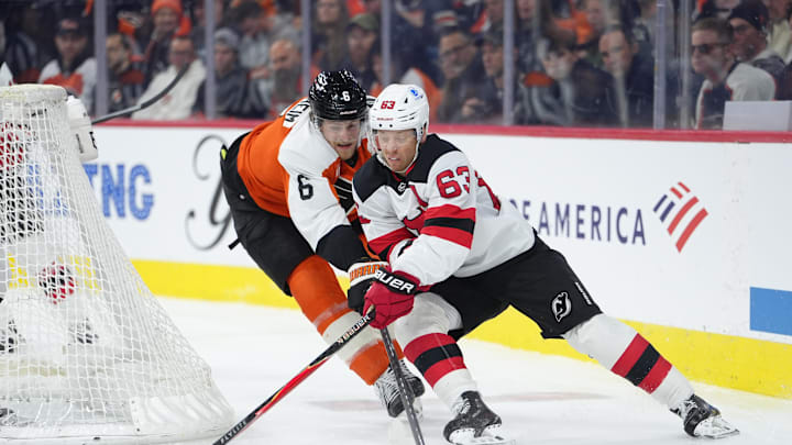 Nov 22, 2025; Philadelphia, Pennsylvania, USA; New Jersey Devils left wing Jesper Bratt (63) controls the puck against Philadelphia Flyers defenseman Travis Sanheim (6) in the second period at Xfinity Mobile Arena. Mandatory Credit: Kyle Ross-Imagn Images Nov 22, 2025; Philadelphia, Pennsylvania, USA; New Jersey Devils left wing Jesper Bratt (63) controls the puck against Philadelphia Flyers defenseman Travis Sanheim (6) in the second period at Xfinity Mobile Arena. Mandatory Credit: Kyle Ross-Imagn Images