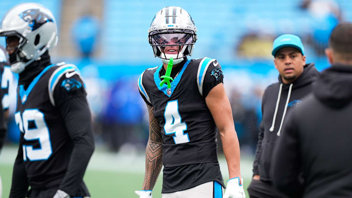 Nov 30, 2025; Charlotte, North Carolina, USA; Carolina Panthers wide receiver Tetairoa McMillan (4) looks on before the game against the Los Angeles Rams at Bank of America Stadium. Mandatory Credit: Jim Dedmon-Imagn Images Nov 30, 2025; Charlotte, North Carolina, USA; Carolina Panthers wide receiver Tetairoa McMillan (4) looks on before the game against the Los Angeles Rams at Bank of America Stadium. Mandatory Credit: Jim Dedmon-Imagn Images