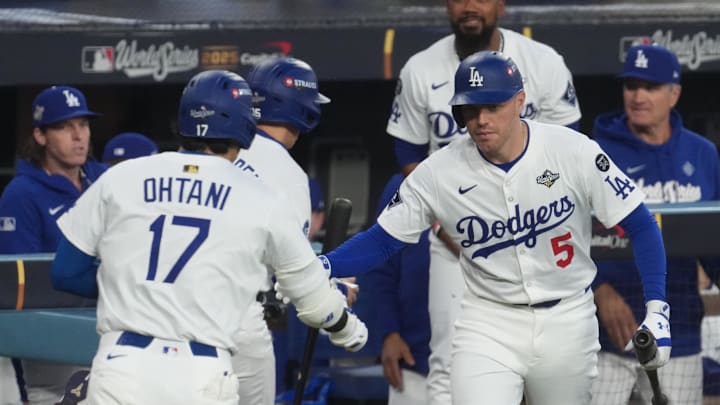 Oct 27, 2025; Los Angeles, California, USA; Los Angeles Dodgers designated hitter Shohei Ohtani (17) celebrates with first baseman Freddie Freeman (5) after hitting a home run during the third inning against the Toronto Blue Jays in game three of the 2025 MLB World Series at Dodger Stadium. Mandatory Credit: Kirby Lee-Imagn Images Oct 27, 2025; Los Angeles, California, USA; Los Angeles Dodgers designated hitter Shohei Ohtani (17) celebrates with first baseman Freddie Freeman (5) after hitting a home run during the third inning against the Toronto Blue Jays in game three of the 2025 MLB World Series at Dodger Stadium. Mandatory Credit: Kirby Lee-Imagn Images