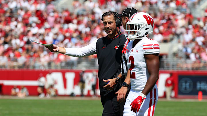 Sep 13, 2025; Tuscaloosa, Alabama, USA; Wisconsin Badgers head coach Luke Fickell discusses a call with an official during the second quarter against the Alabama Crimson Tide at Saban Field at Bryant-Denny Stadium.