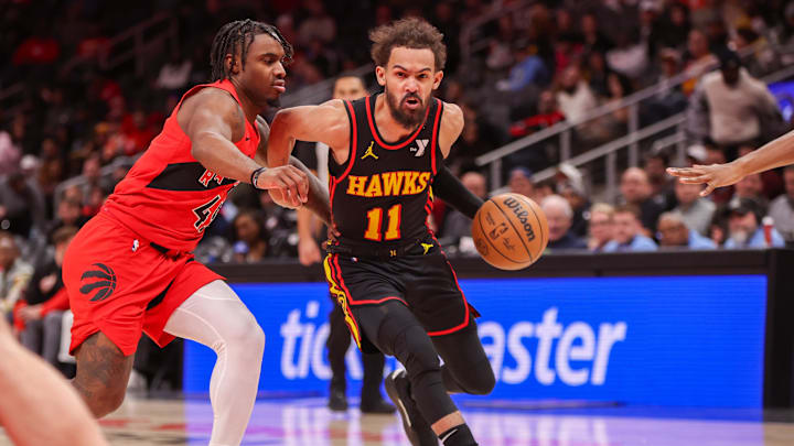 Jan 23, 2025; Atlanta, Georgia, USA; Atlanta Hawks guard Trae Young (11) drives past Toronto Raptors guard Davion Mitchell (45) in the first quarter at State Farm Arena. Mandatory Credit: Brett Davis-Imagn Images Jan 23, 2025; Atlanta, Georgia, USA; Atlanta Hawks guard Trae Young (11) drives past Toronto Raptors guard Davion Mitchell (45) in the first quarter at State Farm Arena. Mandatory Credit: Brett Davis-Imagn Images