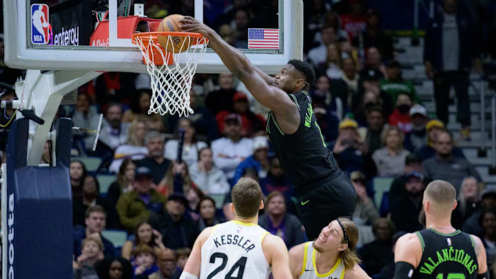 Jan 23, 2024; New Orleans, Louisiana, USA; New Orleans Pelicans forward Zion Williamson (1) dunks over Utah Jazz forward Kelly Olynyk (41) during the second half at Smoothie King Center. Mandatory Credit: Matthew Hinton-Imagn Images
