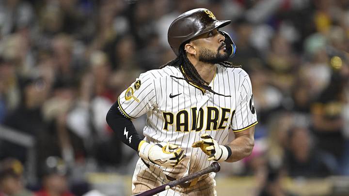 Jun 23, 2026; San Diego, California, USA; San Diego Padres right fielder Fernando Tatis Jr. (23) hits a solo home run during the seventh inning against the Atlanta Braves at Petco Park. Mandatory Credit: Denis Poroy-Imagn Images