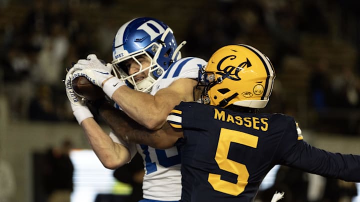 Cal cornerback Hezekiah Masses could not prevent Duke's Cooper Barkate from catching a touchdown pass. Cal cornerback Hezekiah Masses could not prevent Duke's Cooper Barkate from catching a touchdown pass.