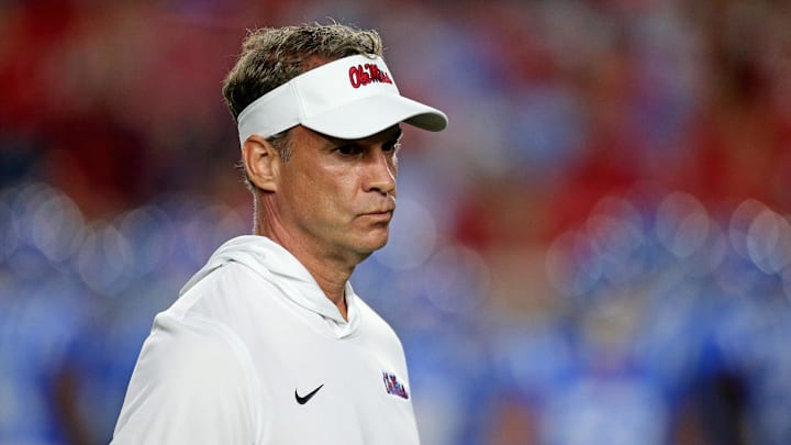 Oxford, Mississippi, USA; Mississippi Rebels head coach Lane Kiffin looks on during warm-ups prior to the game against the Florida Gators at Vaught-Hemingway Stadium. 