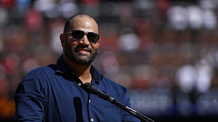 Oct 1, 2023; St. Louis, Missouri, USA;  St. Louis Cardinals former player Albert Pujols speaks at a retirement ceremony for starting pitcher Adam Wainwright (not pictured) before a game against the Cincinnati Reds at Busch Stadium. Mandatory Credit: Jeff Curry-Imagn Images