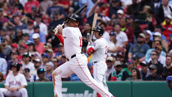 May 8, 2025; Boston, Massachusetts, USA; Boston Red Sox designated hitter Rafael Devers (11) hits a home run against the Texas Rangers in the seventh inning at Fenway Park. Mandatory Credit: David Butler II-Imagn Images May 8, 2025; Boston, Massachusetts, USA; Boston Red Sox designated hitter Rafael Devers (11) hits a home run against the Texas Rangers in the seventh inning at Fenway Park. Mandatory Credit: David Butler II-Imagn Images