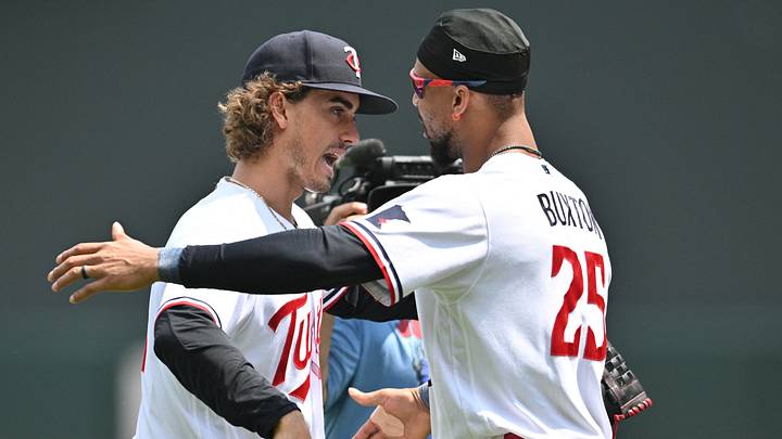 Jun 22, 2023; Minneapolis, Minnesota, USA; Minnesota Twins starting pitcher Joe Ryan (41) and designated hitter Byron Buxton (25) react after the game against the Boston Red Sox at Target Field. Mandatory Credit: Jeffrey Becker-USA TODAY Sports