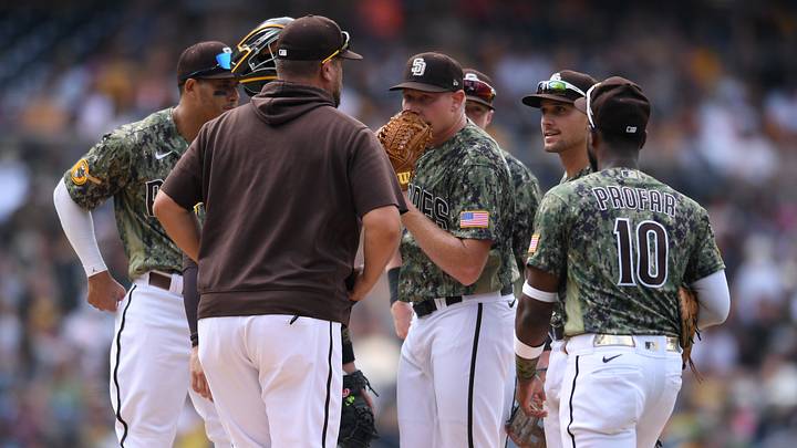 Sep 5, 2021; San Diego, California, USA; San Diego Padres pitching coach Ben Fritz (near) meets with relief pitcher Mark Melancon (center) on the mound during the ninth inning against the Houston Astros at Petco Park. Mandatory Credit: Orlando Ramirez-USA TODAY Sports Sep 5, 2021; San Diego, California, USA; San Diego Padres pitching coach Ben Fritz (near) meets with relief pitcher Mark Melancon (center) on the mound during the ninth inning against the Houston Astros at Petco Park. Mandatory Credit: Orlando Ramirez-USA TODAY Sports