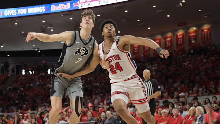 Feb 28, 2026; Houston, Texas, USA;  Colorado Buffaloes forward Sebastian Rancik (7) tries to block out Houston Cougars forward Chase McCarty (24) in the second  half at Fertitta Center. Mandatory Credit: Thomas Shea-Imagn Images
