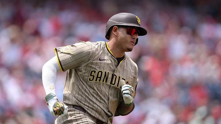 Jul 2, 2025; Philadelphia, Pennsylvania, USA; San Diego Padres third base Manny Machado (13) runs the bases after hitting a three RBI double during the second inning against the Philadelphia Phillies at Citizens Bank Park. Mandatory Credit: Bill Streicher-Imagn Images