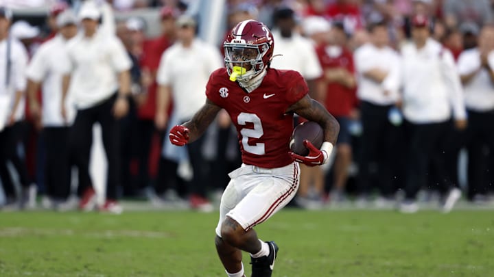 Oct 26, 2024; Tuscaloosa, Alabama, USA;  Alabama Crimson Tide wide receiver Ryan Williams (2) carries the ball after a reception against the Missouri Tigers during the second half at Bryant-Denny Stadium. Mandatory Credit: Butch Dill-Imagn Images