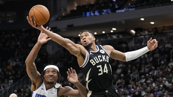 Jan 15, 2025; Milwaukee, Wisconsin, USA; Milwaukee Bucks forward Giannis Antetokounmpo (34) reaches for a rebound during the second quarter against the Orlando Magic at Fiserv Forum. Mandatory Credit: Jeff Hanisch-Imagn Images Jan 15, 2025; Milwaukee, Wisconsin, USA; Milwaukee Bucks forward Giannis Antetokounmpo (34) reaches for a rebound during the second quarter against the Orlando Magic at Fiserv Forum. Mandatory Credit: Jeff Hanisch-Imagn Images