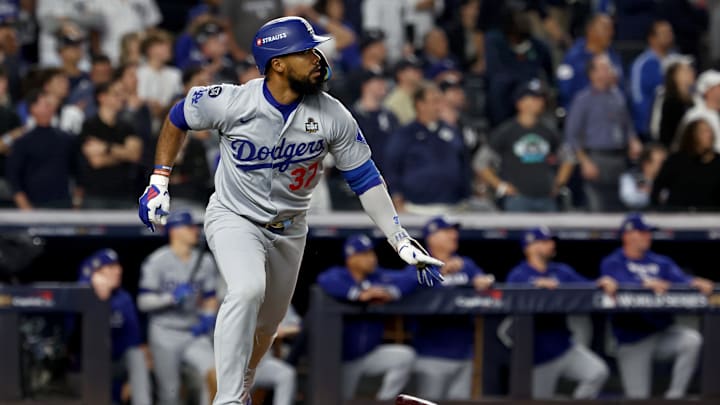Oct 30, 2024; New York, New York, USA; Los Angeles Dodgers outfielder Teoscar Hernandez (37) hits a two-RBI double during the fifth inning against the New York Yankees in game five of the 2024 MLB World Series at Yankee Stadium. Mandatory Credit: Vincent Carchietta-Imagn Images