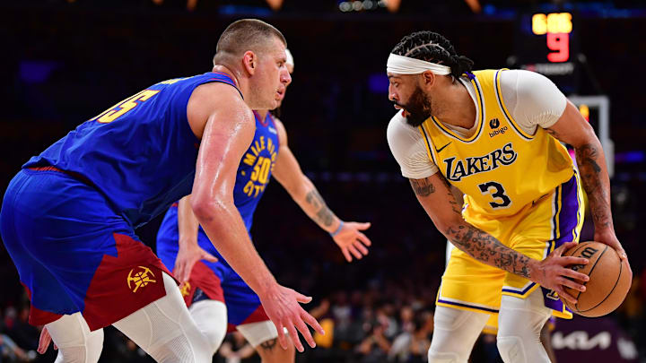 Los Angeles Lakers forward Anthony Davis (3) controls the ball against Denver Nuggets center Nikola Jokic (15) during the second half in game three of the first round for the 2024 NBA playoffs at Crypto.com Arena. Mandatory Credit: Gary A. Vasquez-Imagn Images Los Angeles Lakers forward Anthony Davis (3) controls the ball against Denver Nuggets center Nikola Jokic (15) during the second half in game three of the first round for the 2024 NBA playoffs at Crypto.com Arena. Mandatory Credit: Gary A. Vasquez-Imagn Images