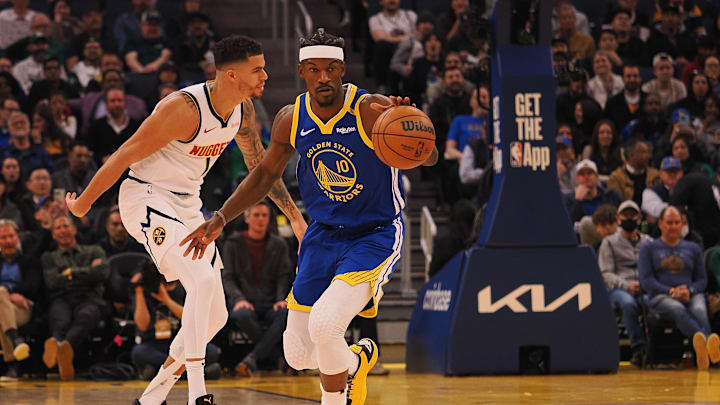 Mar 17, 2025; San Francisco, California, USA; Golden State Warriors forward Jimmy Butler III (10) steals the ball against Denver Nuggets forward Michael Porter Jr. (1) during the first quarter at Chase Center. Mandatory Credit: Kelley L Cox-Imagn Images Mar 17, 2025; San Francisco, California, USA; Golden State Warriors forward Jimmy Butler III (10) steals the ball against Denver Nuggets forward Michael Porter Jr. (1) during the first quarter at Chase Center. Mandatory Credit: Kelley L Cox-Imagn Images