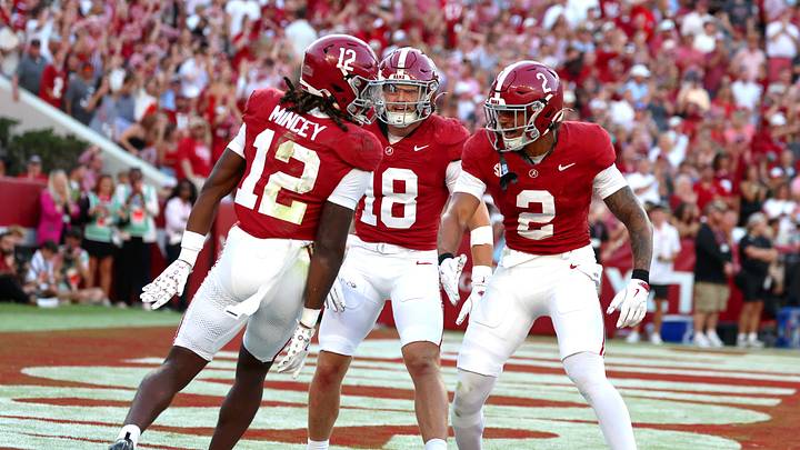 Oct 4, 2025; Tuscaloosa, Alabama, USA; Alabama Crimson Tide defensive back Zavier Mincey (12) celebrates his overturned interception with teammates during the second half against the Vanderbilt Commodores at Saban Field at Bryant-Denny Stadium. Mandatory Credit: David Leong-Imagn Images