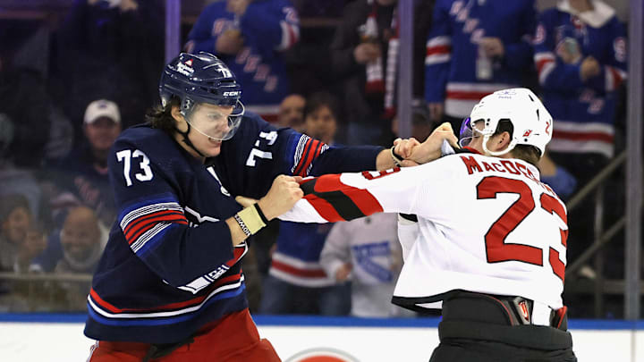 Matt Rempe squares off against Kurtis MacDermid
