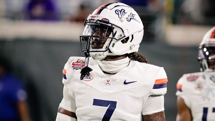 Dec 27, 2025; Jacksonville, FL, USA; Virginia Cavaliers wide receiver Jahmal Edrine (7) warms up before the Gator Bowl against the Missouri Tigers at EverBank Stadium. Mandatory Credit: Travis Register-Imagn Images