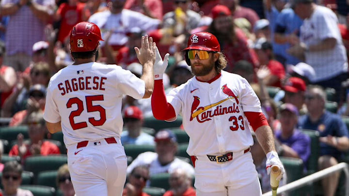 Aug 13, 2025; St. Louis, Missouri, USA; St. Louis Cardinals third baseman Thomas Saggese (25) is congratulated by second baseman Brendan Donovan (33) after scoring against the Colorado Rockies during the second inning at Busch Stadium. Mandatory Credit: Jeff Curry-Imagn Images Aug 13, 2025; St. Louis, Missouri, USA; St. Louis Cardinals third baseman Thomas Saggese (25) is congratulated by second baseman Brendan Donovan (33) after scoring against the Colorado Rockies during the second inning at Busch Stadium. Mandatory Credit: Jeff Curry-Imagn Images