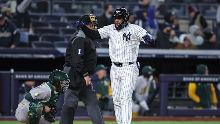 Apr 7, 2026; Bronx, New York, USA;  New York Yankees third baseman Amed Rosario (14) hits a three run home run in the eighth inning against the Athletics at Yankee Stadium. Mandatory Credit: Wendell Cruz-Imagn Images