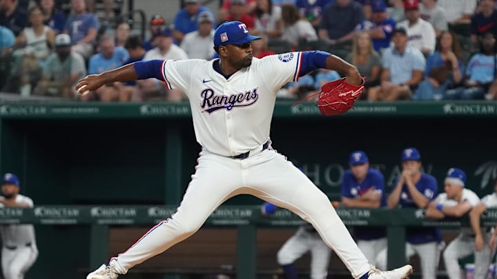 Texas Rangers starting pitcher Kumar Rocker throws to the plate.