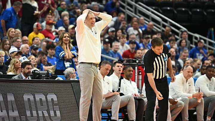 Mar 20, 2026; St. Louis, MO, USA; Kentucky Wildcats head coach Mark Pope reacts to a call made by referee Tony Padilla during the second half of a first round game of the men's 2026 NCAA Tournament against the Santa Clara Broncos at Enterprise Center. Mandatory Credit: Jeff Le-Imagn Images