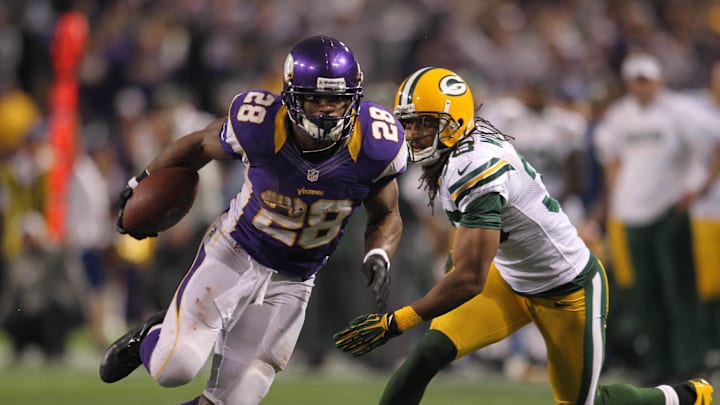 Dec 30, 2012; Minneapolis, MN, USA; Minnesota Vikings running back Adrian Peterson (28) carries the ball during the fourth quarter against the Green Bay Packers at the Metrodome. The Vikings defeated the Packers 37-34. Mandatory Credit: Brace Hemmelgarn-Imagn Images Dec 30, 2012; Minneapolis, MN, USA; Minnesota Vikings running back Adrian Peterson (28) carries the ball during the fourth quarter against the Green Bay Packers at the Metrodome. The Vikings defeated the Packers 37-34. Mandatory Credit: Brace Hemmelgarn-Imagn Images