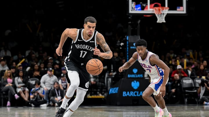 Nov 2, 2025; Brooklyn, New York, USA; Brooklyn Nets forward Michael Porter Jr. (17) leads a fast break as Philadelphia 76ers guard VJ Edgecombe (77) pursues during the second half at Barclays Center. Mandatory Credit: John Jones-Imagn Images