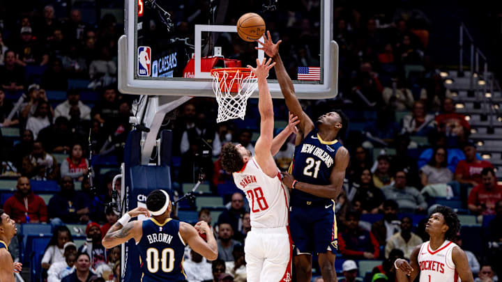 Mar 6, 2025; New Orleans, Louisiana, USA;  New Orleans Pelicans center Yves Missi (21) blocks the shot of Houston Rockets center Alperen Sengun (28) during the first half at Smoothie King Center. Mandatory Credit: Stephen Lew-Imagn Images