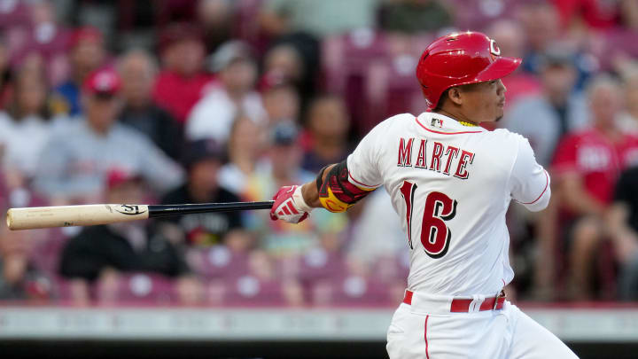 Cincinnati Reds shortstop Noelvi Marte (16) hits a one-run single in the second inning of a baseball game against the Minnesota Twins, Monday, Sept. 18, 2023, at Great American Ball Park in Cincinnati.