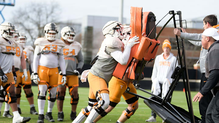 Tennessee offensive lineman Parker Ball (65) and Tennessee offensive lineman Cooper Mays (63) run Tennessee offensive lineman Parker Ball (65) and Tennessee offensive lineman Cooper Mays (63) run