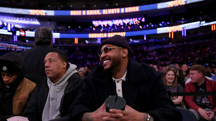Jan 17, 2024; New York, New York, USA; New York Knicks former player Carmelo Anthony sits court side during the second quarter between the New York Knicks and the Houston Rockets at Madison Square Garden. Mandatory Credit: Brad Penner-Imagn Images