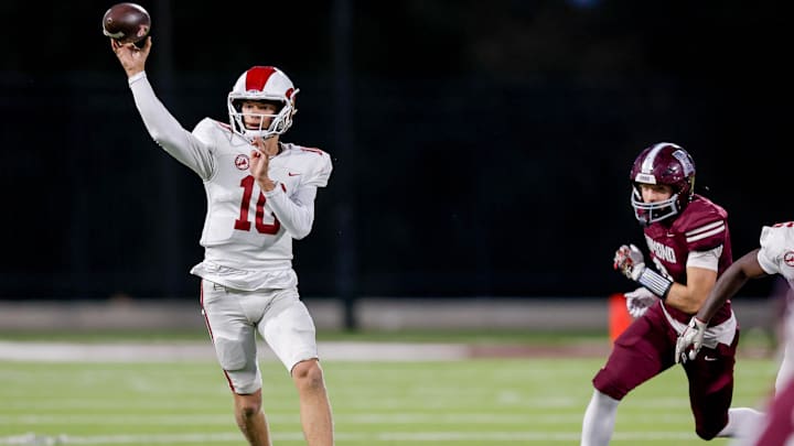 Owasso’s Drew Frankenfield (10) passes the ball during a high school football game between Edmond Memorial and Owasso in Edmond, Okla. on Thursday, Oct. 17, 2024.