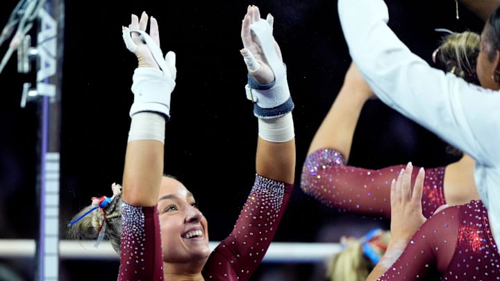 Oklahoma's Audrey Davis celebrates following the uneven bars during the college women's gymnastic meet between the University of Oklahoma Sooners and the Missouri Tigers at Lloyd Noble Center in Norman, Okla., Friday, Jan., 17, 2025. Oklahoma's Audrey Davis celebrates following the uneven bars during the college women's gymnastic meet between the University of Oklahoma Sooners and the Missouri Tigers at Lloyd Noble Center in Norman, Okla., Friday, Jan., 17, 2025.