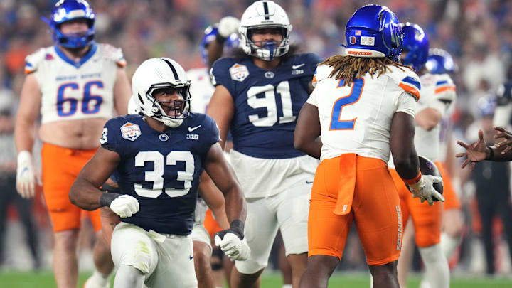 Penn State's Dani Dennis-Sutton (33) celebrates his tackle of Boise State running back Ashton Jeanty. Penn State's Dani Dennis-Sutton (33) celebrates his tackle of Boise State running back Ashton Jeanty.