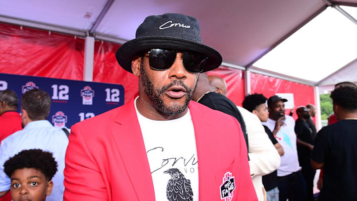 Jun 12, 2024; Foxborough, MA, USA; Former NFL player Ty Law walks the red carpet at the New England Patriots Hall of Fame induction ceremony for Tom Brady at Gillette Stadium. Mandatory Credit: Eric Canha-Imagn Images
