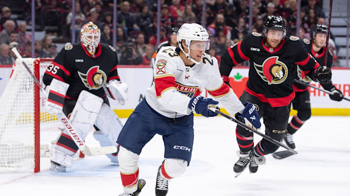 Oct 10, 2024; Ottawa, Ontario, CAN; Florida Panthers center Carter Verhaeghe (23) chases the puck in the second period against the Ottawa Senators at the Canadian Tire Centre. Mandatory Credit: Marc DesRosiers-Imagn Images