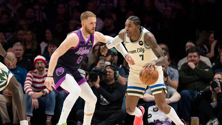 Dec 21, 2025; Minneapolis, Minnesota, USA; Milwaukee Bucks guard Kevin Porter Jr. (7) dribbles the ball as Minnesota Timberwolves guard Donte Divincenzo (0) plays defense in the second half at Target Center. Mandatory Credit: Jesse Johnson-Imagn Images Dec 21, 2025; Minneapolis, Minnesota, USA; Milwaukee Bucks guard Kevin Porter Jr. (7) dribbles the ball as Minnesota Timberwolves guard Donte Divincenzo (0) plays defense in the second half at Target Center. Mandatory Credit: Jesse Johnson-Imagn Images