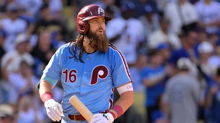 Oct 9, 2025; Los Angeles, California, USA; Philadelphia Phillies center fielder Brandon Marsh (16) reacts after striking out in the first inning against the Los Angeles Dodgers during game four of the NLDS round for the 2025 MLB playoffs at Dodger Stadium. Mandatory Credit: Jayne Kamin-Oncea-Imagn Images