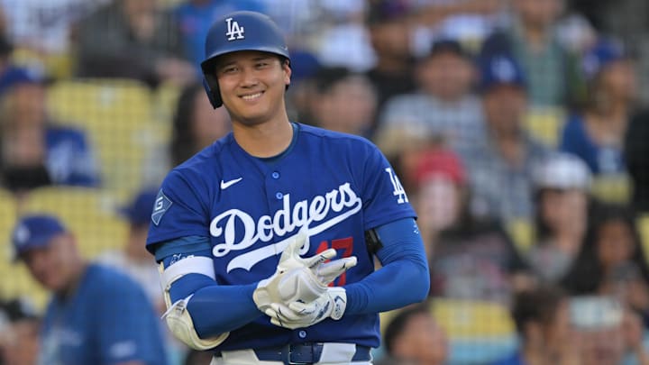 Mar 24, 2026; Los Angeles, California, USA;  Los Angeles Dodgers two-way player Shohei Ohtani (17) on deck in the fourth against the Los Angeles Angels at Dodger Stadium. Mandatory Credit: Jayne Kamin-Oncea-Imagn Images