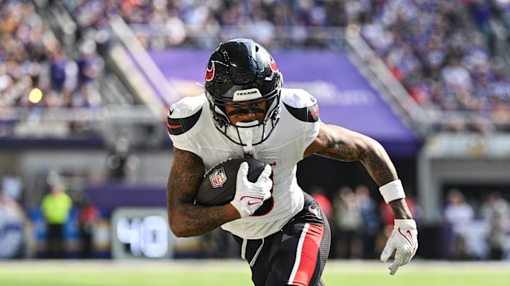 Sep 22, 2024; Minneapolis, Minnesota, USA; Houston Texans wide receiver Tank Dell (3) runs the ball against the Minnesota Vikings during the third quarter at U.S. Bank Stadium. Mandatory Credit: Jeffrey Becker-Imagn Images