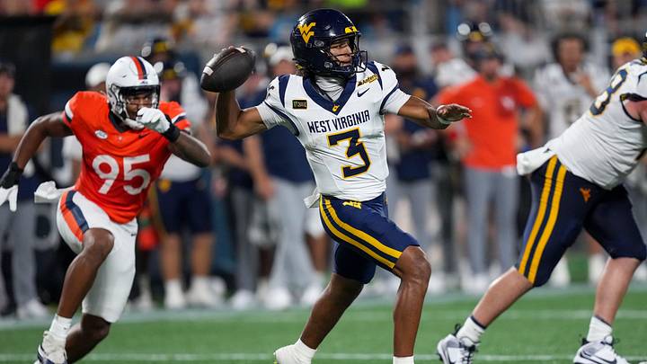 Sep 19, 2026; Charlotte, North Carolina, USA; West Virginia Mountaineers quarterback Michael Hawkins Jr. (3) throws a pass against the Virginia Cavaliers during the second quarter at Bank of America Stadium. Mandatory Credit: Jim Dedmon-Imagn Images Sep 19, 2026; Charlotte, North Carolina, USA; West Virginia Mountaineers quarterback Michael Hawkins Jr. (3) throws a pass against the Virginia Cavaliers during the second quarter at Bank of America Stadium. Mandatory Credit: Jim Dedmon-Imagn Images