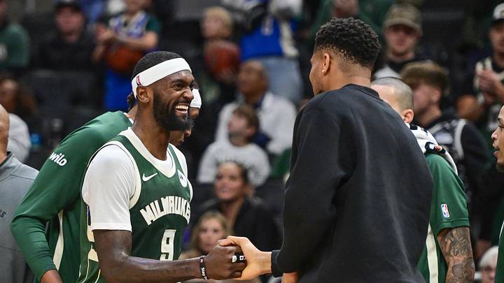 Dec 11, 2025; Milwaukee, Wisconsin, USA; Milwaukee Bucks forward Bobby Portis (9) celebrates with forward Giannis Antetokounmpo (34) in the fourth quarter against the Boston Celtics at Fiserv Forum. Mandatory Credit: Benny Sieu-Imagn Images