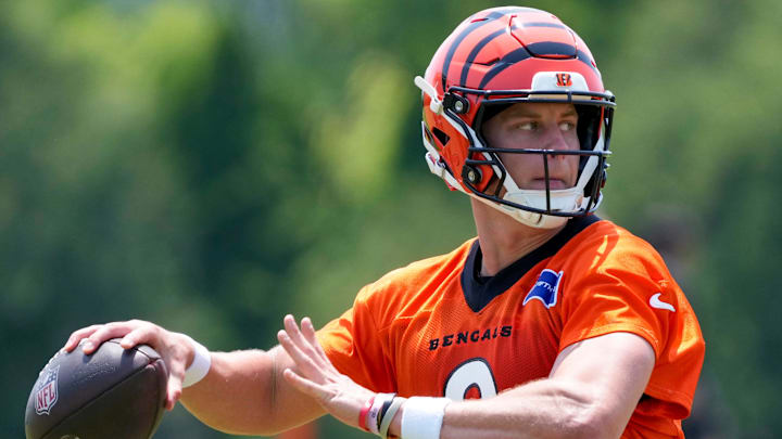Cincinnati Bengals quarterback Joe Burrow (9) throws a pass during a session of organized team activities on the Bengals practice field at Paycor Stadium in downtown Cincinnati on Tuesday, June 3, 2025.