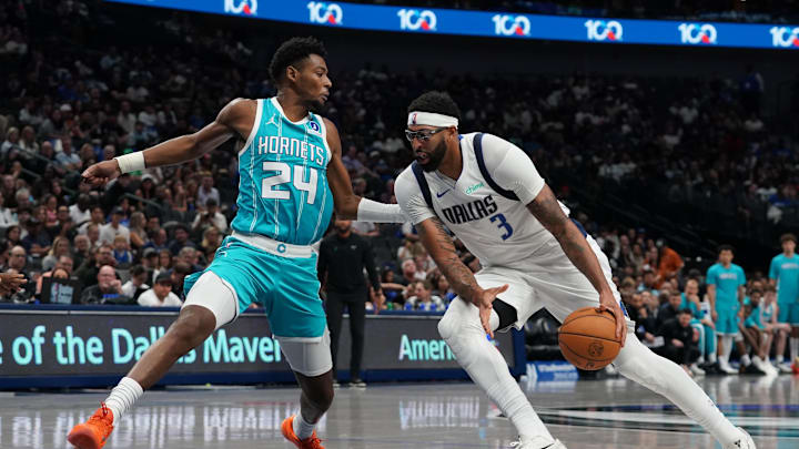 Oct 11, 2025; Dallas, Texas, USA; Dallas Mavericks forward/center Anthony Davis (3) works on Charlotte Hornets forward Brandon Miller (24) in the second half of a game at American Airlines Center. Mandatory Credit: Raymond Carlin III-Imagn Images