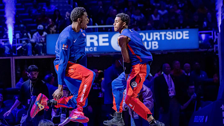 Mar 15, 2024; Detroit, Michigan, USA; Detroit Pistons center Jalen Duren (0) and guard Jaden Ivey (23) jump in the air before the start of the first quarter at Little Caesars Arena. Mandatory Credit: David Reginek-Imagn Images